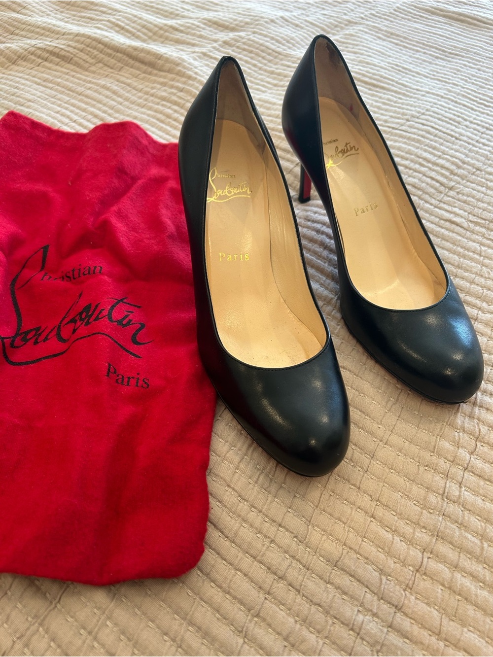 Christian Louboutin simple black pump. Size 39. ( I’m an 8 and it works)
